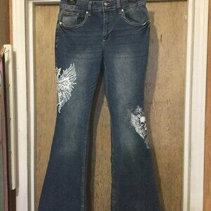 Hot topic flared bottom jeans with stretch designs on legs with bling on pockets